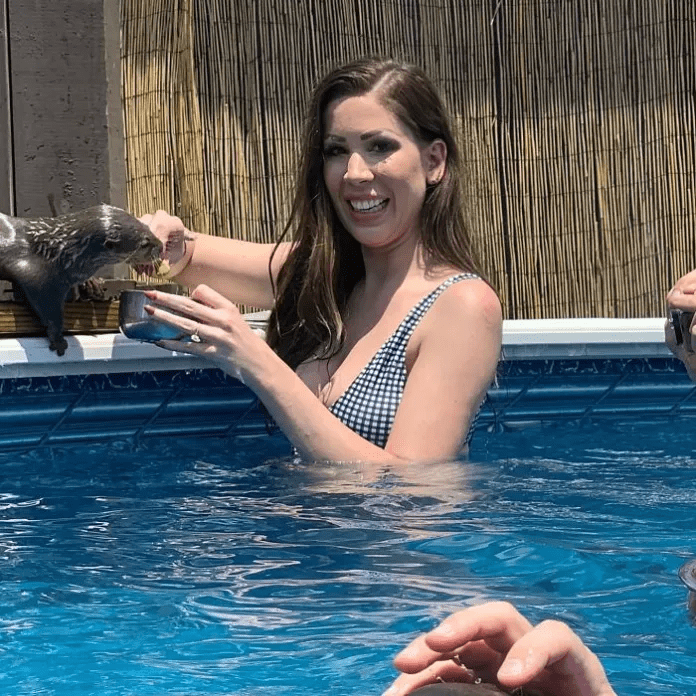 swim with baby otters