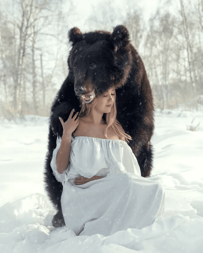 Woman And A Bear