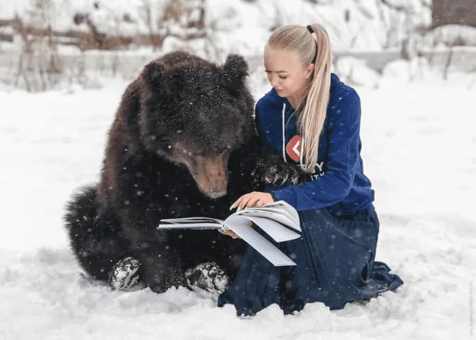 Woman And A Bear