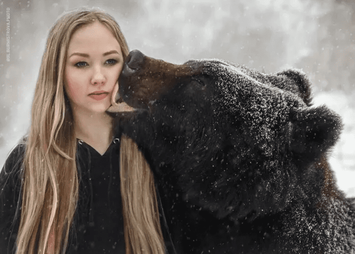 Woman And A Bear