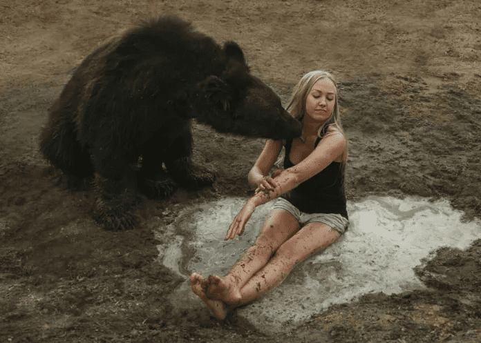 Woman And A Bear