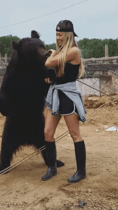 Woman And A Bear