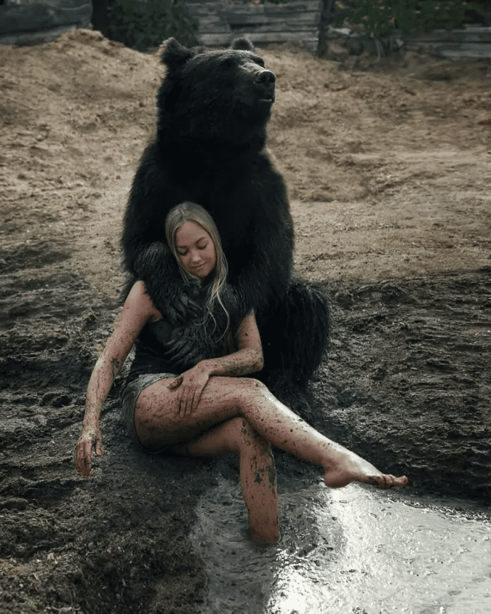 Woman And A Bear