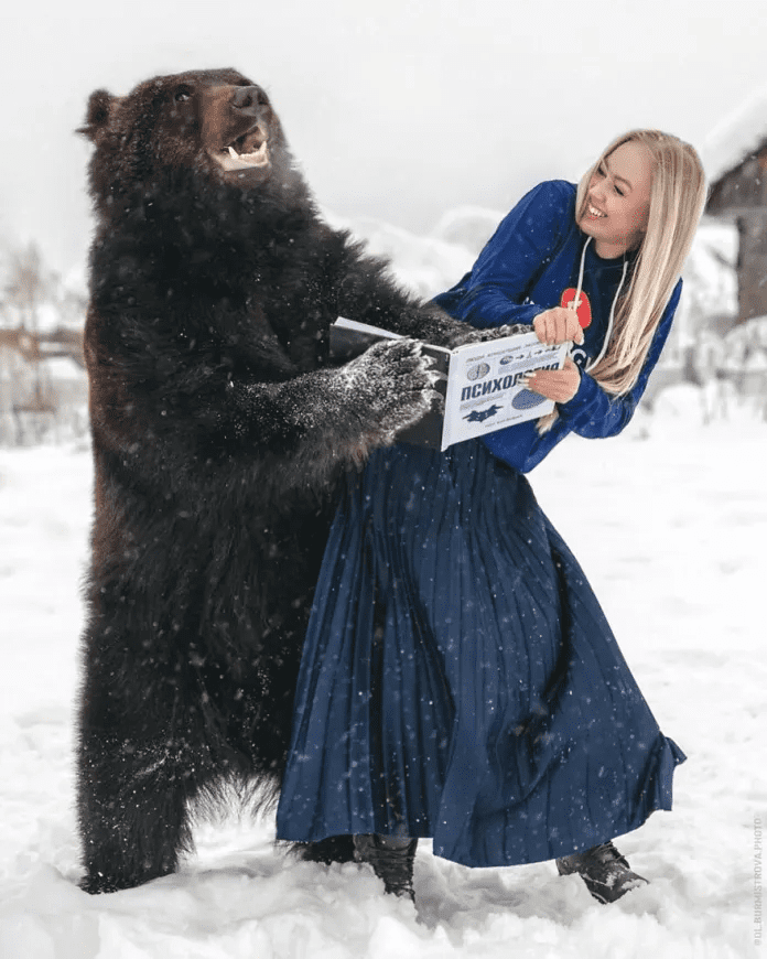 Woman And A Bear