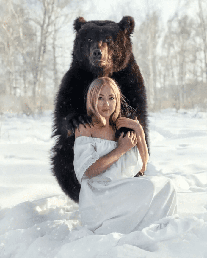 Woman And A Bear