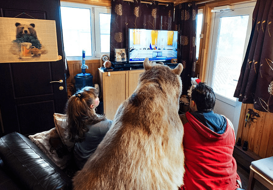 Russian Couple with Orphaned Bear 